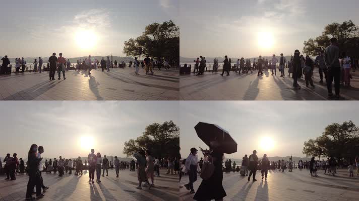 杭州西湖边傍晚的散步的行人路人