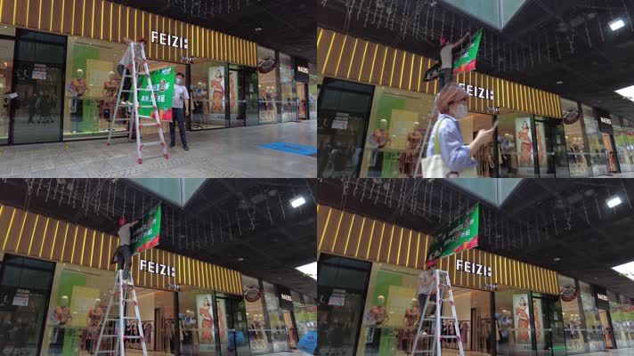 工人安装广告横幅