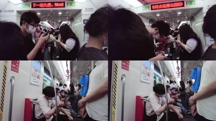 坐地铁玩手机的旅客
