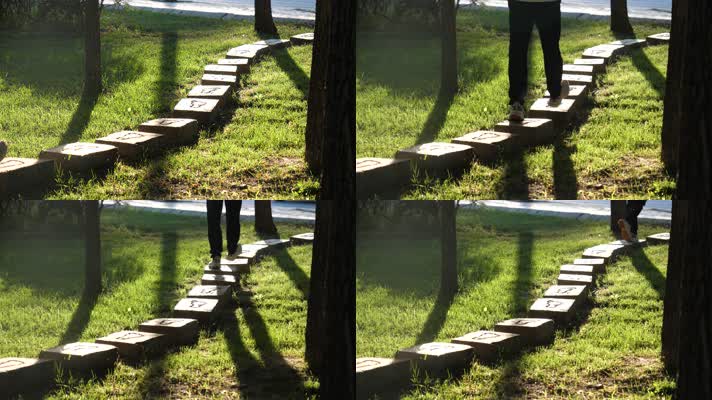 男生走过公园小路