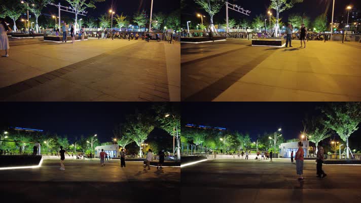 夜晚公园广场休闲散步跳舞的人们