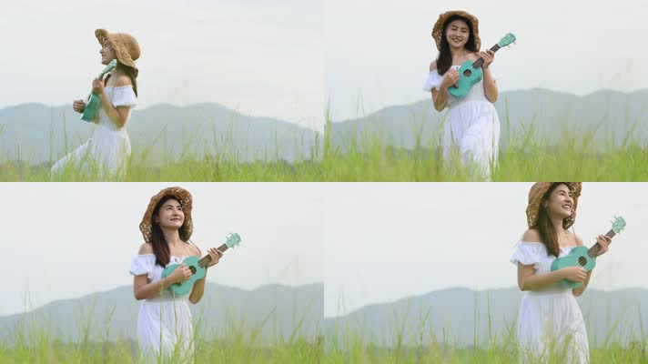 年轻女士在青草丛山区演奏四弦琴开心大笑