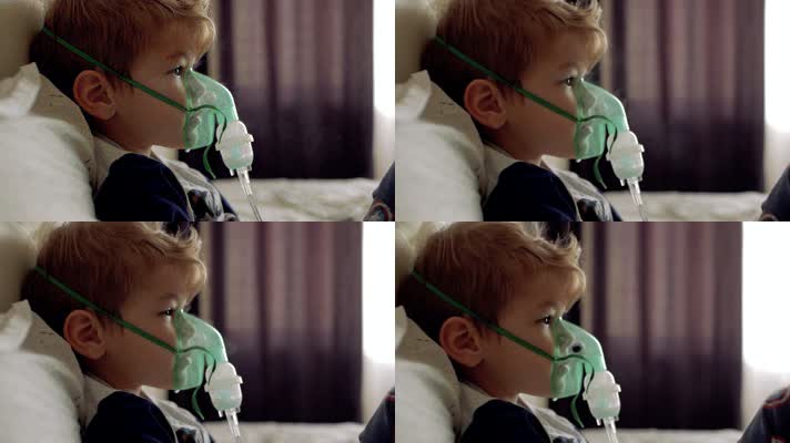 男孩吸入器透明面罩呼吸治疗