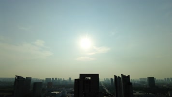 城市清晨太阳升起日出延时摄影