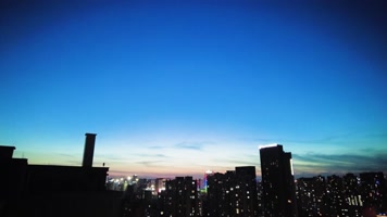 城市夜幕降临时分日转夜风景延时摄影视频素材