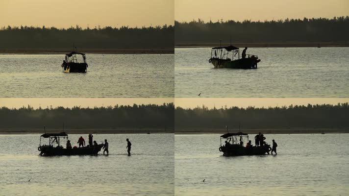 海南岛小渔村清晨出海的渔民