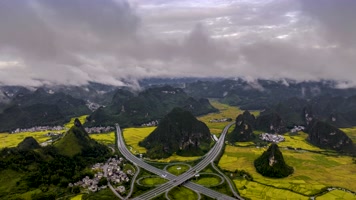 4K延时航拍百色靖西高速互通云海