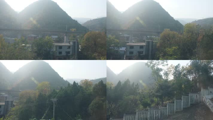 火车上拍摄秋天秦岭山中的城镇