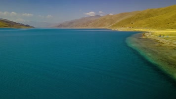 4K延时航拍西藏山南浪卡子县羊湖光影
