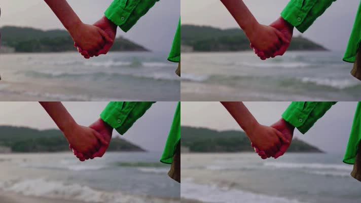 8K情侣手牵手在海边沙滩上散步唯美素材