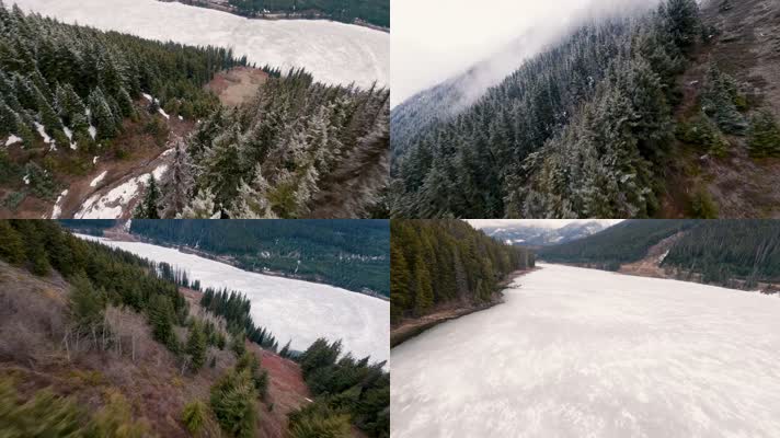 冬季穿越机飞越森林雪山山脉航拍
