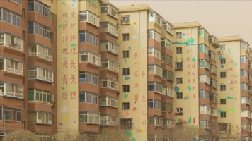 沙尘浮沉扬沙大风春季东北民居楼房环保宣传