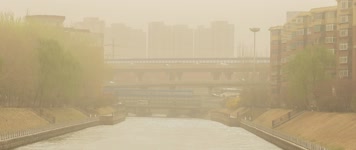 沙尘浮沉扬沙大风春季东北运河立交桥
