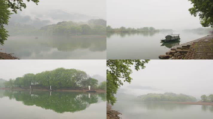清明烟雨江南水乡古镇小船晨雾水面倒影