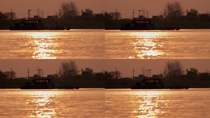 黄昏夕阳下的货船河道剪影