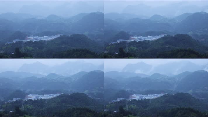 俯视小雨群峰云雾缭绕的山脚下工厂
