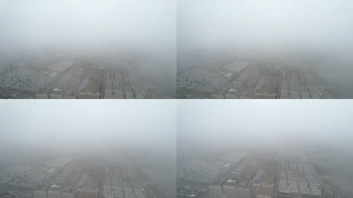航拍阴云乌云雾霾笼罩下的城市
