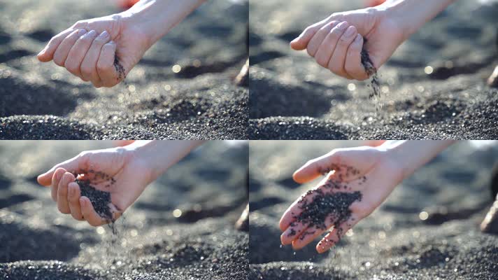 手中散落的火山砂细碎鹅卵石