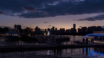 浑河晚霞夜景日转夜城市夜航游船码头河岸建