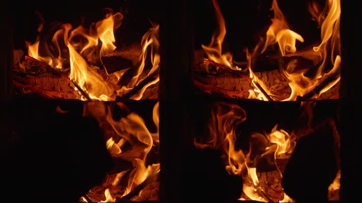 往篝火里添加木柴火焰升格慢镜头