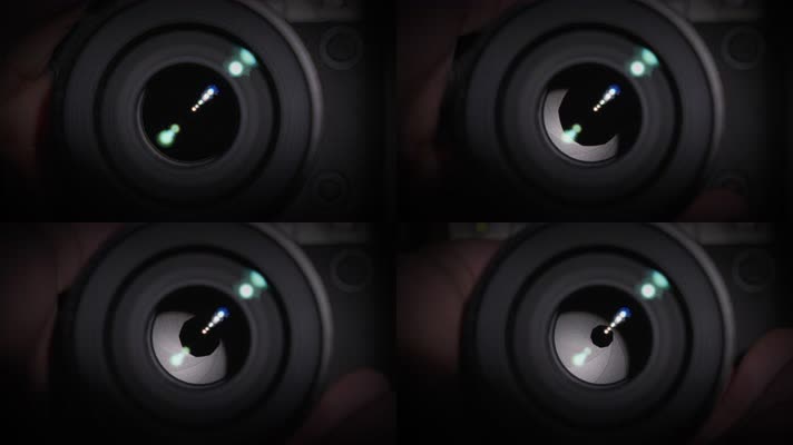 用手拧动相机镜头光圈环摄影