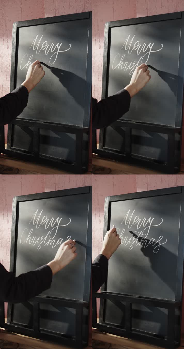 粉笔在黑板上写字圣诞快乐