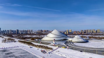 延时航拍哈尔滨大剧院蓝天白云