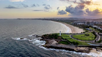 延时航拍悉尼卧龙岗市灯塔晚霞