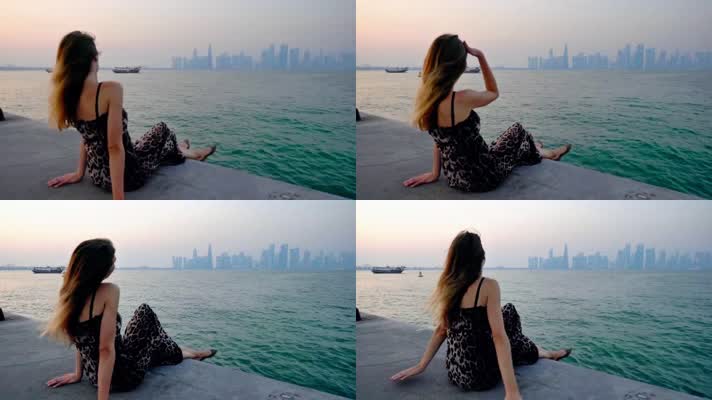 4k海边女孩午后惬意休闲吹风高清视频素材