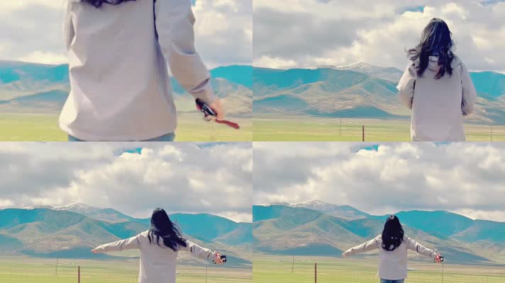4k雪山草原美女蹦跑旅游休闲高清视频
